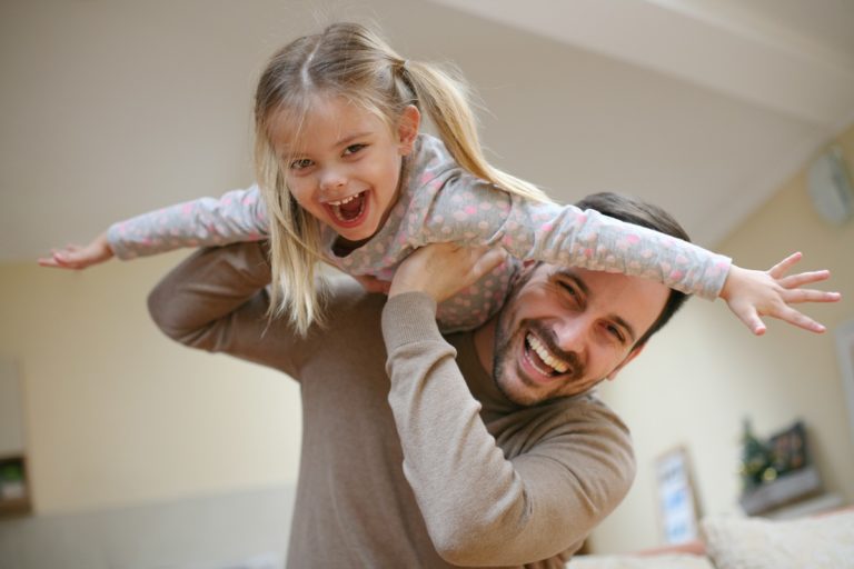father playing with his kid
